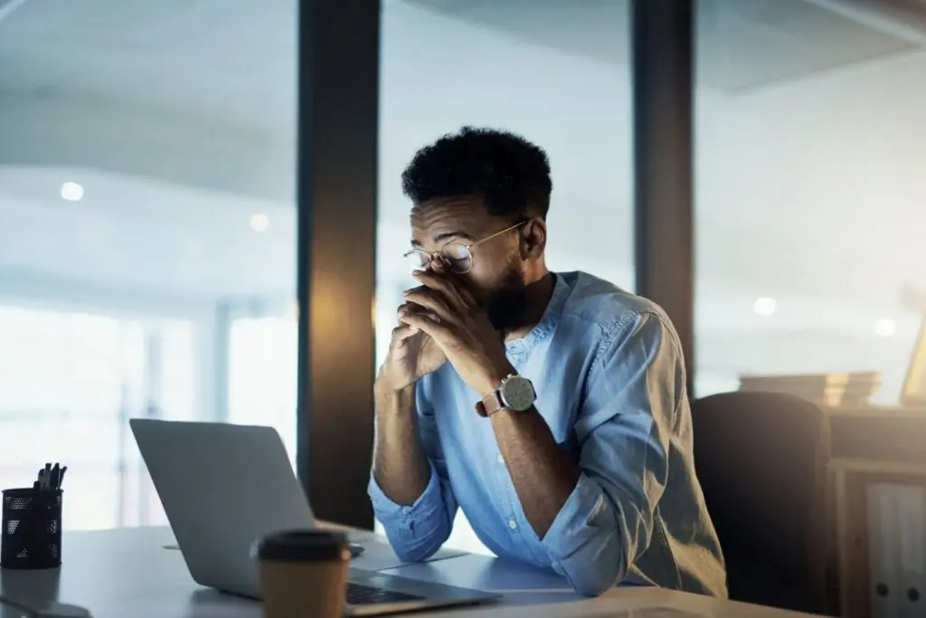 Man sitting at laptop